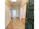 Inviting foyer with tile flooring leading into a spacious living area at 3907 Applegate Cir, Brandon, FL 33511