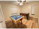 Fun game room with pool table and foosball table, perfect for entertainment at 3907 Applegate Cir, Brandon, FL 33511