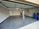 A spacious two car garage with epoxy floors and a bright, clean space at 3907 Applegate Cir, Brandon, FL 33511
