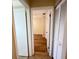 Hallway view showcasing bedroom and closet at 3907 Applegate Cir, Brandon, FL 33511