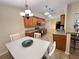 Charming eat-in kitchen with granite countertops, stainless steel appliances, and wood cabinetry at 3907 Applegate Cir, Brandon, FL 33511