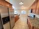 Modern kitchen featuring stainless steel appliances and a stylish tile backsplash at 3907 Applegate Cir, Brandon, FL 33511