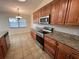 Well-equipped kitchen with modern appliances, granite countertops, and ample storage space at 3907 Applegate Cir, Brandon, FL 33511