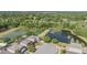 Aerial view of home with beautiful pond views at 417 Ventura Dr, Oldsmar, FL 34677