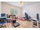 Bedroom with a ceiling fan, a window with shutters and some items on the floor at 417 Ventura Dr, Oldsmar, FL 34677