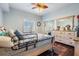 Comfortable bedroom features a built-in closet and light-filtering window coverings for privacy at 417 Ventura Dr, Oldsmar, FL 34677