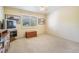 Bedroom with a ceiling fan, a window with shutters and some furniture pieces at 417 Ventura Dr, Oldsmar, FL 34677