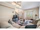 Cozy living room with a view of the staircase and the front door at 417 Ventura Dr, Oldsmar, FL 34677