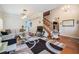 Inviting living room with hardwood floors and staircase at 417 Ventura Dr, Oldsmar, FL 34677