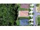 This aerial view showcases the home's proximity to green spaces and highlights its backyard at 4289 Ortona Ln, Wesley Chapel, FL 33543