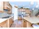 Featuring updated stainless steel appliances and granite counters, this gourmet kitchen is both elegant and functional at 4289 Ortona Ln, Wesley Chapel, FL 33543