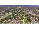 Aerial view showcases this home's desirable location near a tranquil river and verdant golf course at 4340 Narvarez S Way, St Petersburg, FL 33712