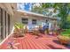 Charming backyard patio with comfortable seating and lush landscaping for relaxation at 4340 Narvarez S Way, St Petersburg, FL 33712