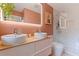 Modern bathroom featuring dual vessel sinks, spacious vanity, and a shower with stylish glass enclosure at 4340 Narvarez S Way, St Petersburg, FL 33712