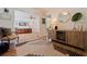Hallway featuring hardwood floors, stylish decor, and access to multiple rooms within the home at 4340 Narvarez S Way, St Petersburg, FL 33712