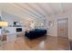 Bright living room showcasing a fireplace, hardwood floors, and a comfortable seating area at 4340 Narvarez S Way, St Petersburg, FL 33712