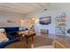 Comfortable living room with stylish decor, vaulted ceilings, and ample seating for relaxation and entertainment at 4340 Narvarez S Way, St Petersburg, FL 33712