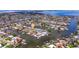 Waterfront home with canal access, featuring a private dock and picturesque views of the surrounding community at 4433 38Th S Way, St Petersburg, FL 33711