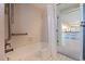 Bathroom featuring a shower/tub combination and access to the main living area at 4433 38Th S Way, St Petersburg, FL 33711