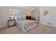 Comfortable bedroom with a ceiling fan, shuttered windows, and calming decor at 4433 38Th S Way, St Petersburg, FL 33711