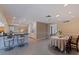 Open kitchen and dining area with recessed lighting, ceiling fans, and breakfast bar seating at 4433 38Th S Way, St Petersburg, FL 33711