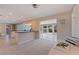 Spacious living area opens to sunroom with breakfast bar and views of the waterfront at 4433 38Th S Way, St Petersburg, FL 33711