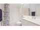 Bright bathroom with a bathtub, shower, and a white vanity with mirror at 4909 Linsey Ct # 0, Sarasota, FL 34243