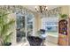 Sunlit breakfast nook with views of the beautiful landscaping and tranquil pond at 4909 Linsey Ct # 0, Sarasota, FL 34243