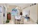 Comfortable dining area with an arched window and ample space for Gathering gatherings at 4909 Linsey Ct # 0, Sarasota, FL 34243