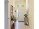 Bright foyer with high ceilings, tile flooring, and decorative accents, creating a welcoming entrance at 4909 Linsey Ct # 0, Sarasota, FL 34243