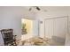 Cozy spare room featuring neutral decor, tile flooring, and ample closet space, offering versatility at 4909 Linsey Ct # 0, Sarasota, FL 34243