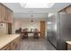 Open kitchen concept leading to dining room for easy Gathering meals at 5263 Kirkwood Ave, Spring Hill, FL 34608