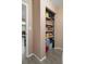 Pantry with built-in shelving for storing groceries at 5263 Kirkwood Ave, Spring Hill, FL 34608