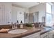 Spacious bathroom featuring dual sinks and a large vanity at 5518 72Nd E Ter, Ellenton, FL 34222