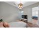 Bedroom with recessed lighting, wood floors, a chandelier and a doorway to a meeting room at 5518 72Nd E Ter, Ellenton, FL 34222