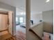 Hallway view of a bedroom with ample light and bathroom at 5518 72Nd E Ter, Ellenton, FL 34222