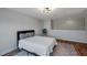 Cozy bedroom features a comfortable bed, stylish rug, and modern lighting fixtures at 5518 72Nd E Ter, Ellenton, FL 34222