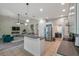 Open concept kitchen featuring modern fixtures, stainless steel appliances, and an easy flow to living space at 5518 72Nd E Ter, Ellenton, FL 34222