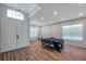 Meeting room with recessed lights, light wood flooring, a black table and two large windows at 5518 72Nd E Ter, Ellenton, FL 34222