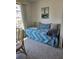 Comfortable living area with daybed near dining set at 5623 80Th N St # 306, St Petersburg, FL 33709