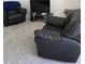Close up on a plush recliner in the living room at 5623 80Th N St # 306, St Petersburg, FL 33709