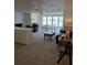 Bright living room with large windows and comfortable seating at 5623 80Th N St # 306, St Petersburg, FL 33709
