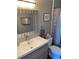 Bathroom featuring a clean vanity and a patterned shower curtain at 6080 80Th N St # 409, St Petersburg, FL 33709