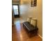 Entryway with bench and striped pillows at 6080 80Th N St # 409, St Petersburg, FL 33709