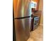 View of kitchen featuring stainless steel appliances and tile backsplash at 6080 80Th N St # 409, St Petersburg, FL 33709