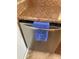 Stainless steel Frigidaire dishwasher with wood-look lower cabinets and countertops at 6080 80Th N St # 409, St Petersburg, FL 33709
