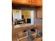 A view from the kitchen sink looking into the dining and living areas at 6080 80Th N St # 409, St Petersburg, FL 33709