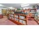 Community library with wooden bookshelves and comfortable seating at 6080 80Th N St # 409, St Petersburg, FL 33709