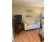 Comfortable living room features a neutral sofa, stylish artwork, and a modern entertainment setup at 6080 80Th N St # 409, St Petersburg, FL 33709