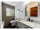 Modern bathroom featuring stylish tilework, a marble countertop, and contemporary fixtures at 6213 12Th S Ave, Gulfport, FL 33707